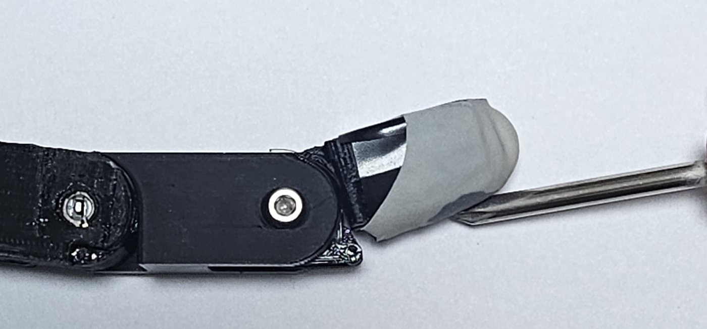 Fingertip deflected by a pushing tool
